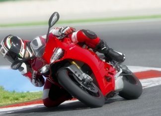 Knee down on the Ducati.